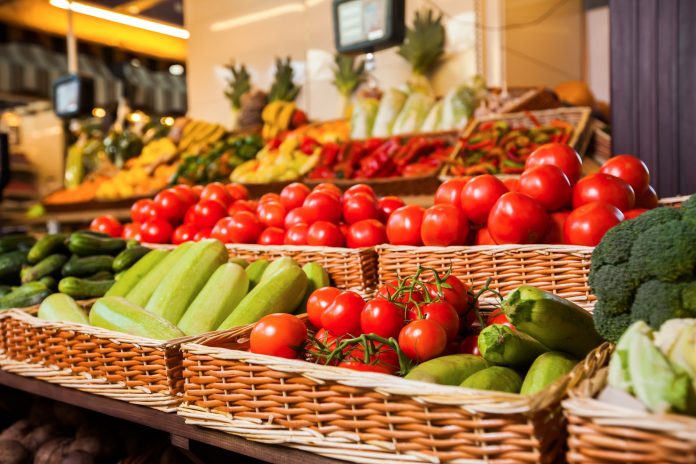 Greengrocery with fresh fruits and vegetables.