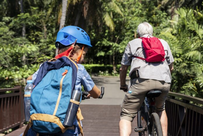 Boy riding a bike in the park