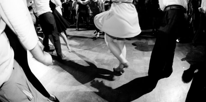 People dancing at the swing dance party